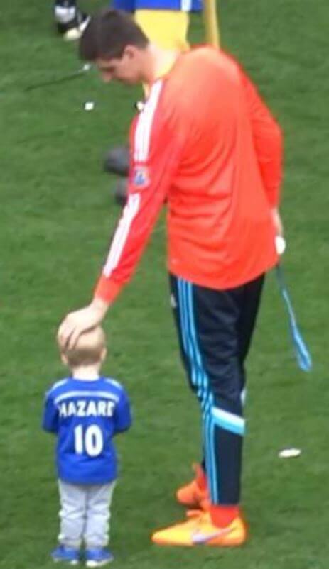 Leo Hazard with his father Eden Hazard on the field.